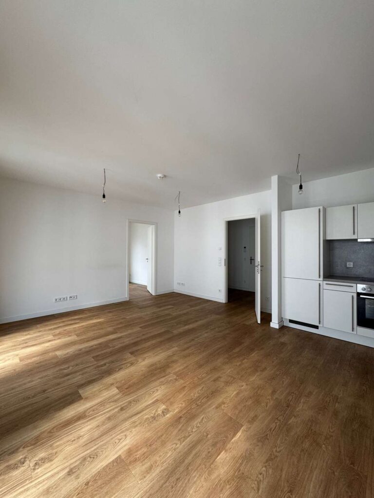 Wohnzimmer mit Küche